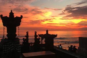 [image of sunset and temple in Bali]